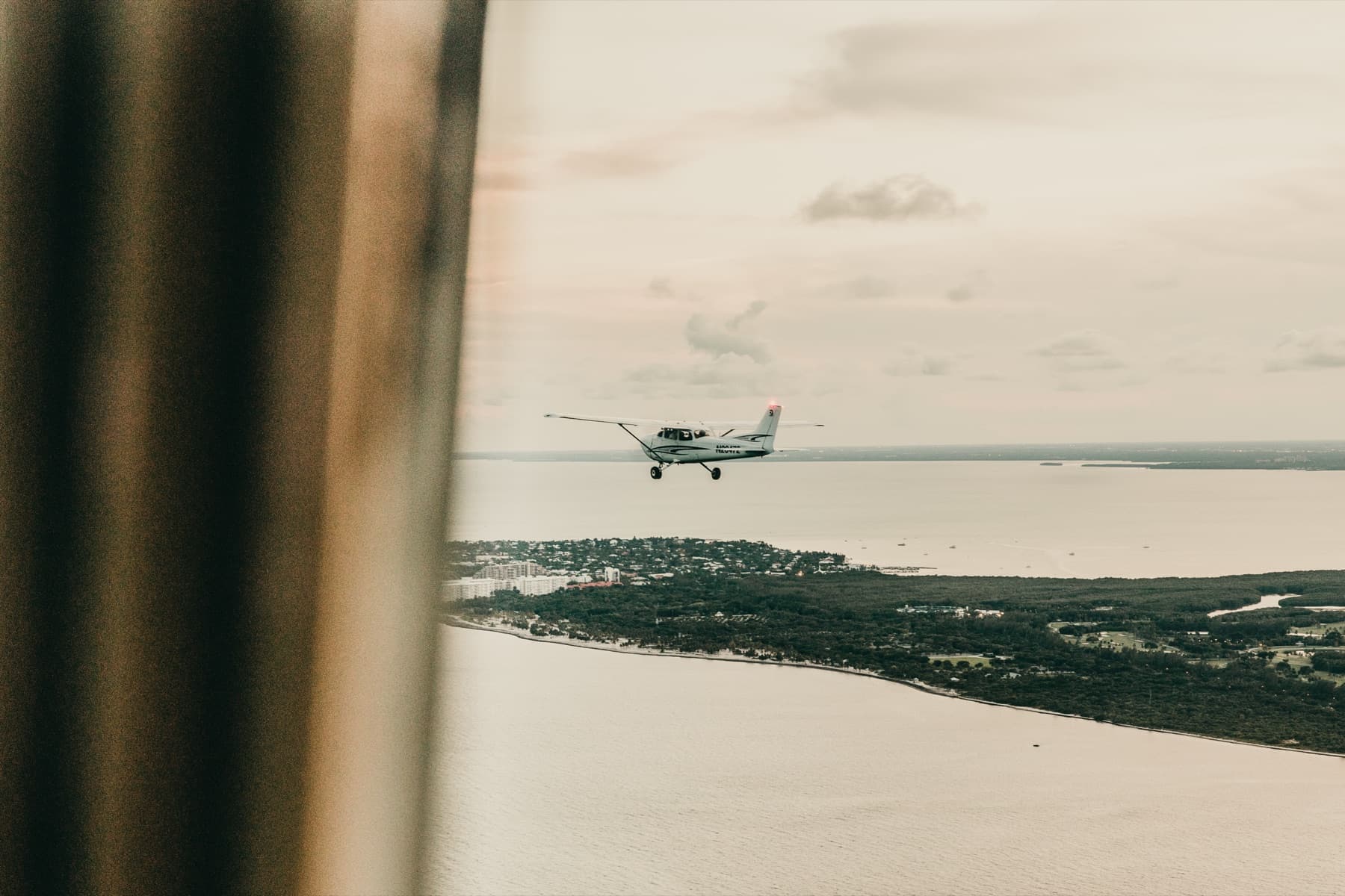 GoFly Cessna 172 in flight over the Florida coast