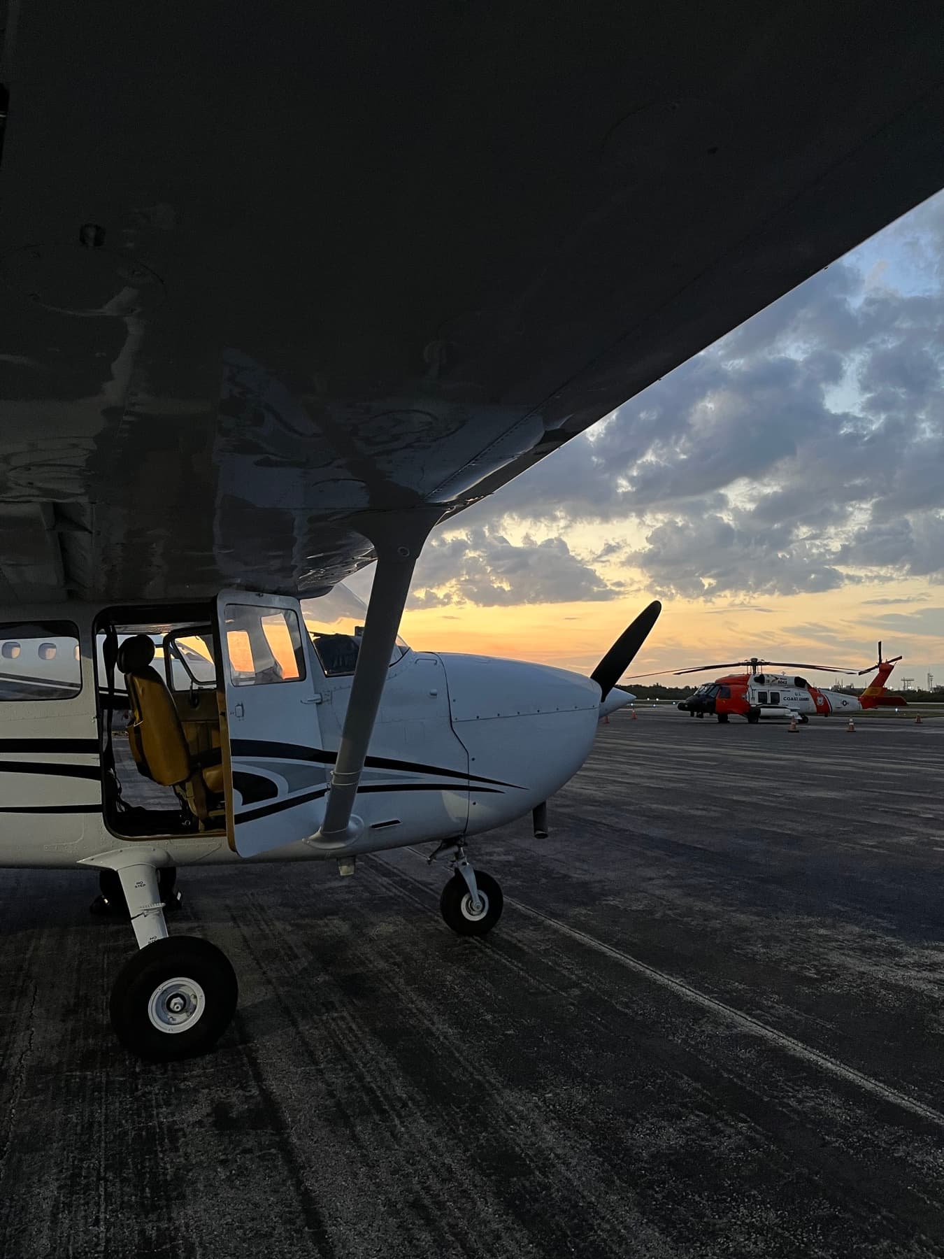 Cessna 172 on the ramp at sunset