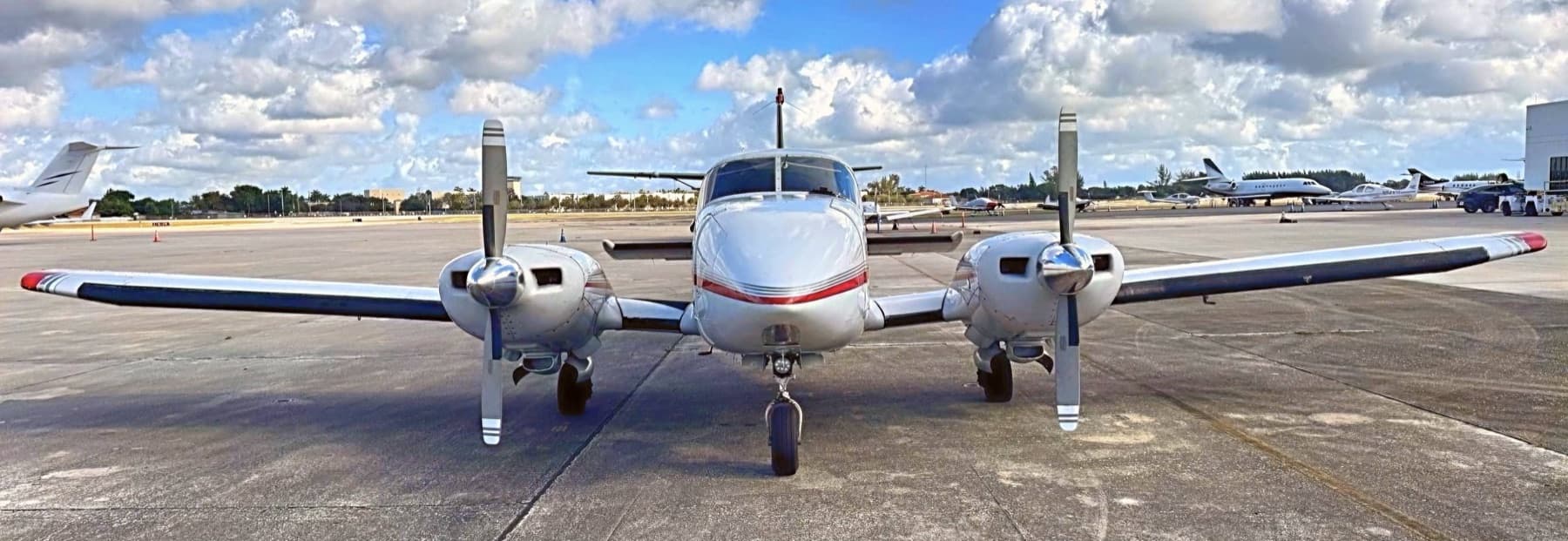 GoFly Academy Piper Aztec F N194ML head-on on the ramp